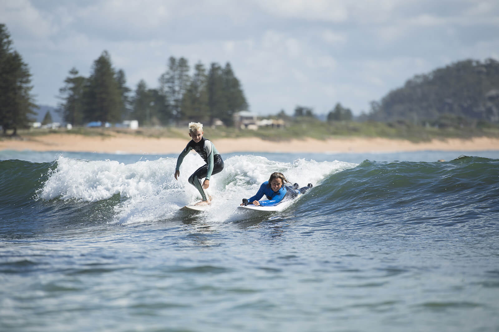 Sam Bloom and Rueben Bloom surfing
