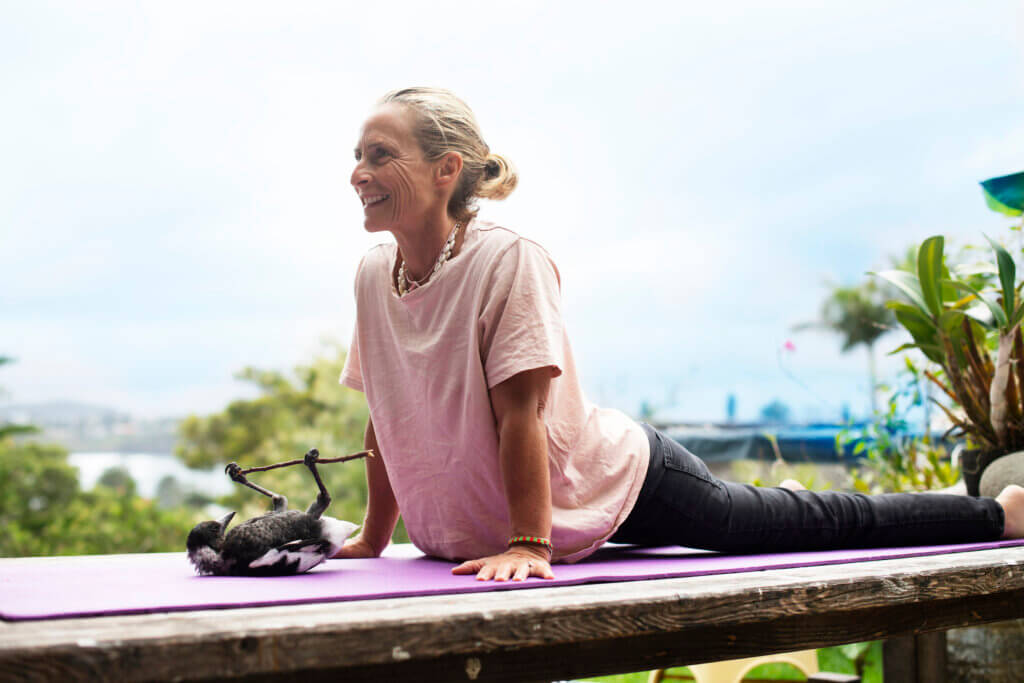 Sam and Penguin the Magpie stretching together